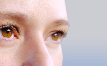 Close-up of a person's eyes looking into the distance, showcasing natural gaze and attention analysis.