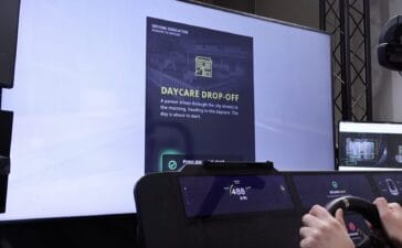 A driving simulation screen showing the 