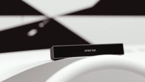 Smart Eye's advanced XO eye tracking system placed on a vehicle dashboard, designed for real-time gaze tracking in automotive and research environments.