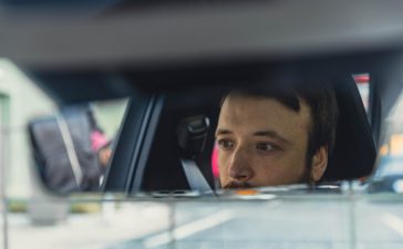Rearview mirror shot in car