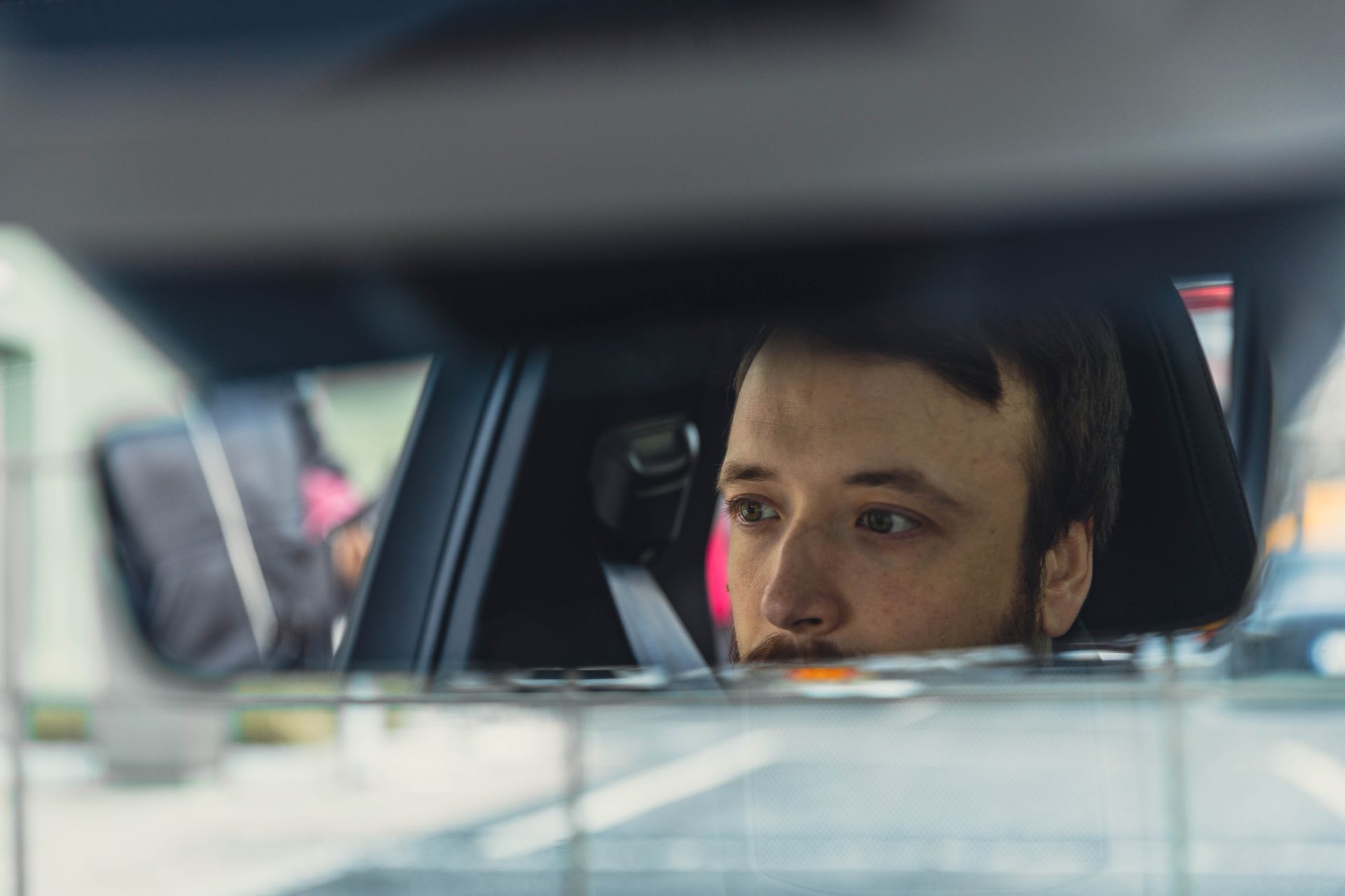 Rearview mirror shot in car